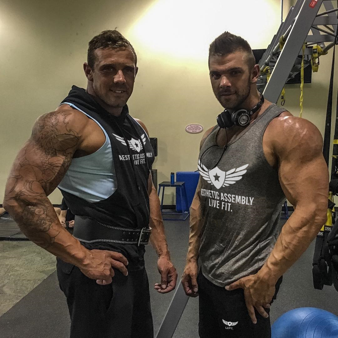 Cơ bắp tập thể dục chó brother new casual trùm đầu vest loại của nam giới không tay thể thao khô nhanh vest đào tạo vest áo gió thể thao nam