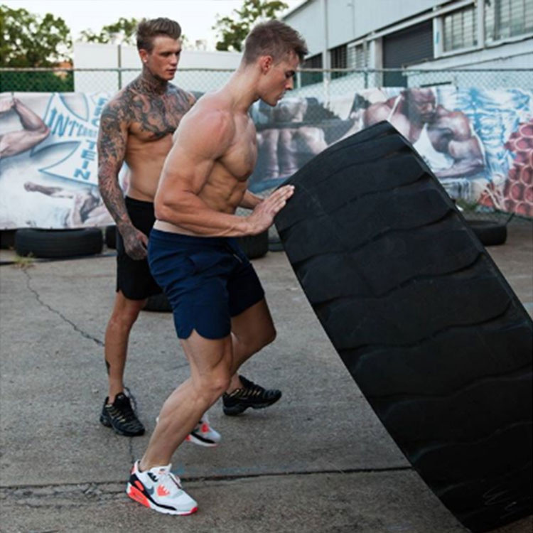 Cơ bắp tập thể dục captain america mùa hè thể thao quần short nam brother chạy đào tạo casual loose breathable phần mỏng năm quần quần thể thao dài