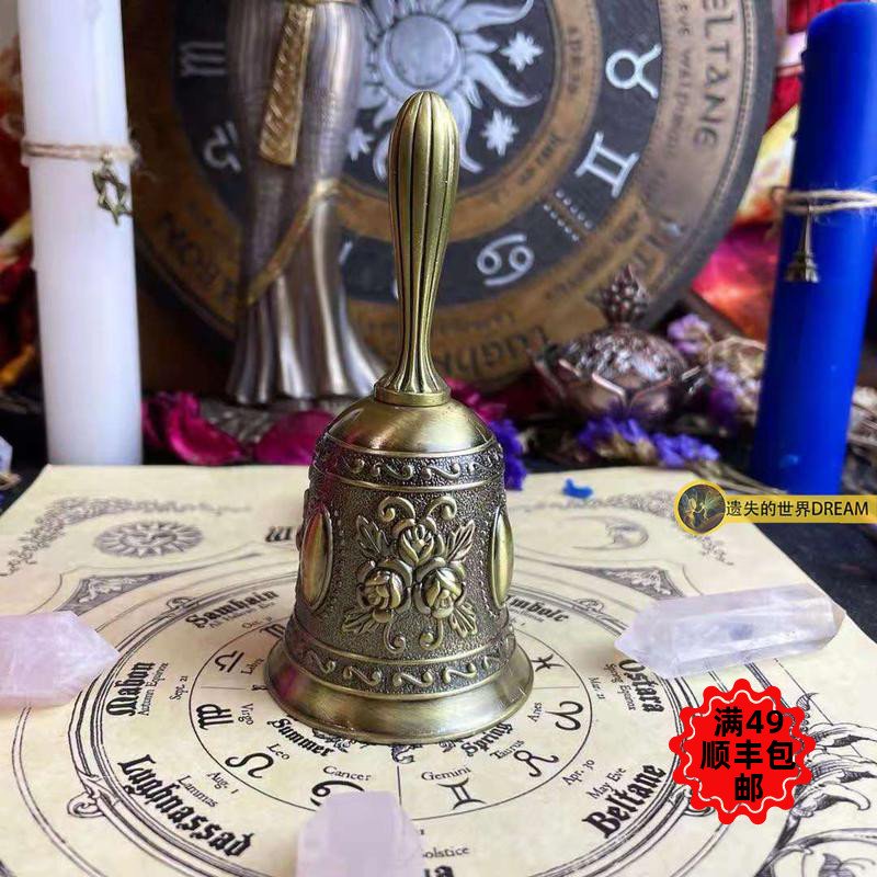 The hand rocking the bell and the mobell bronze bell bronze bell