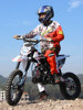 Two-Wheeled Off-Road Motorcycle, Fuel-Powered Vehicle, Competitive Off-Road Vehicle, Children's Mountain Venue, Medium-High Speed Off-Road Vehicle, Small Jump