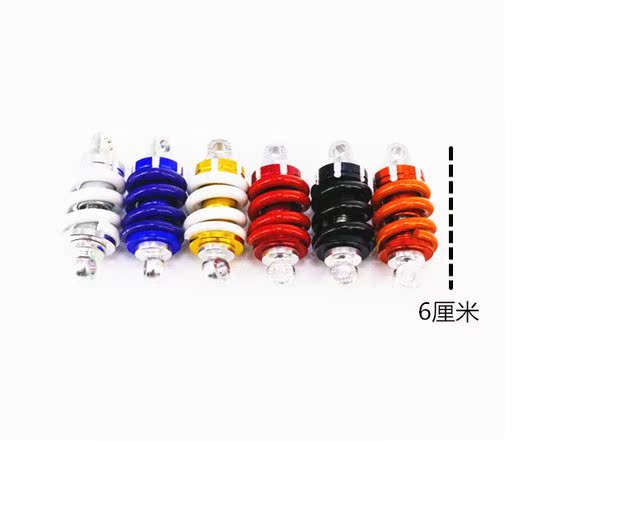 Xe máy sửa đổi phụ kiện bánh xe móc khóa giảm xóc móc khóa WISP cá tính khóa giảm xóc đèn pha led xe máy