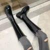 Товары от 傲百丽