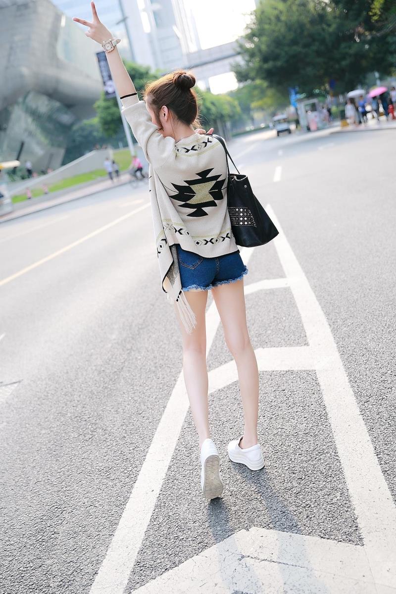 2018 mùa thu mới dài tay hoang dã áo len cardigan bất thường của phụ nữ mặc áo khoác ngoài tua rua cardigan nữ