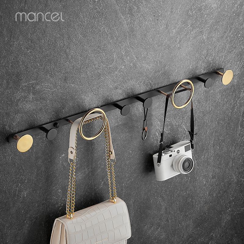 Light luxury shell coat rack bedroom free punching black gold hanging hanger wall wall hanging row hook entryway clothes hook copper