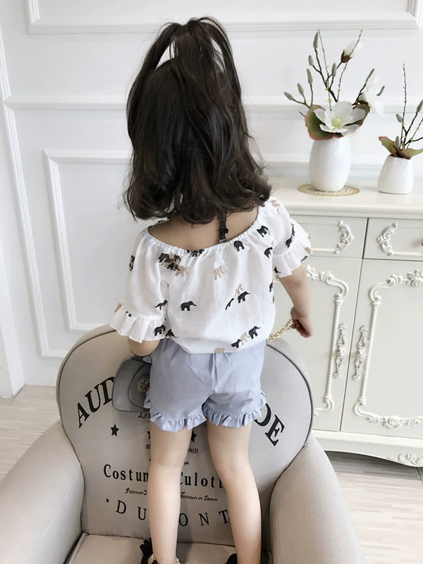 Quần áo trẻ em 2018 hè mới cho bé gái mặc áo gió đại học tay ngắn + quần short bé gái bình thường hai mảnh thủy triều