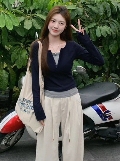 Hong Kong style retro V-neck fake two-piece long-sleeved T-shirt 2025 spring and autumn American style petite hottie right shoulder top for women versatile