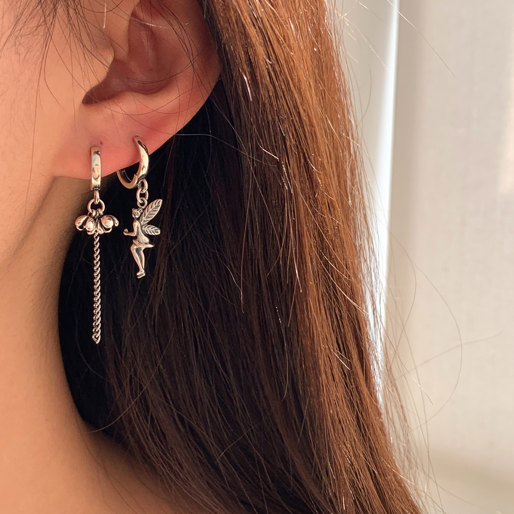 For the late design of the old Thai silver retro flower fairy heavy heavy silver earring INS cold wind asymmetric earring hot style