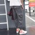 Mùa thu và mùa đông overalls xu hướng nam bỏ túi quần trẻ trung Nhật Bản quần legging nam Quần mỏng