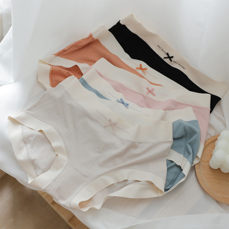 Modal cotton breathable antibacterial underwear seamless nude feeling mid-waist briefs simple solid color girl comfortable