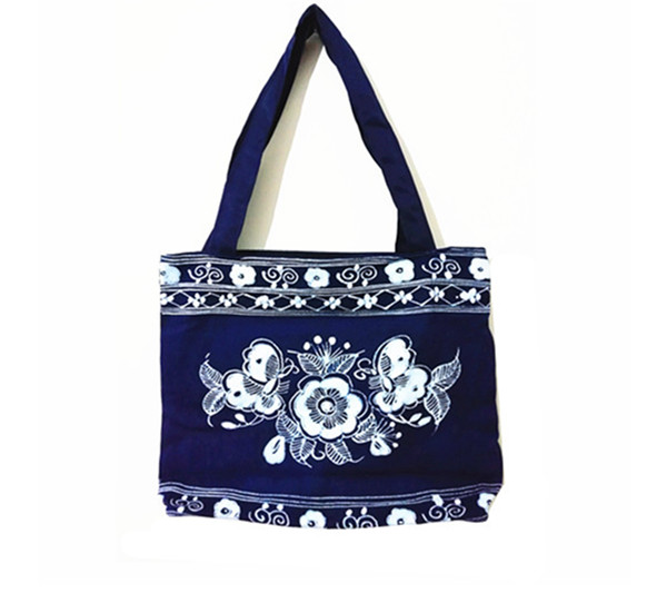 New folk handmade Miao nationality batik bag handbag travel leisure fashion female shoulder shoulder wrist bag meeting gift