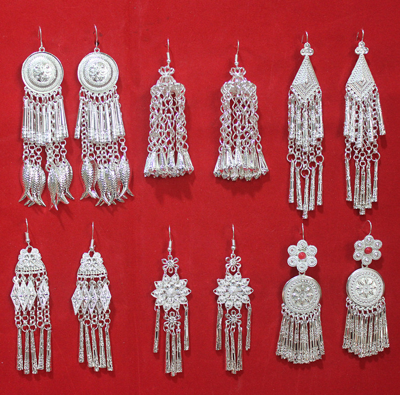 Ethnic minority silver accessories headwear Miao ethnic dance performance wearing exaggerated new flow Su earrings Miao ethnic silver decoration earstring