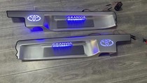 Grevia aluminum alloy main and passenger door sill strips with lights replace the center door pedals and Senna front door welcome pedals