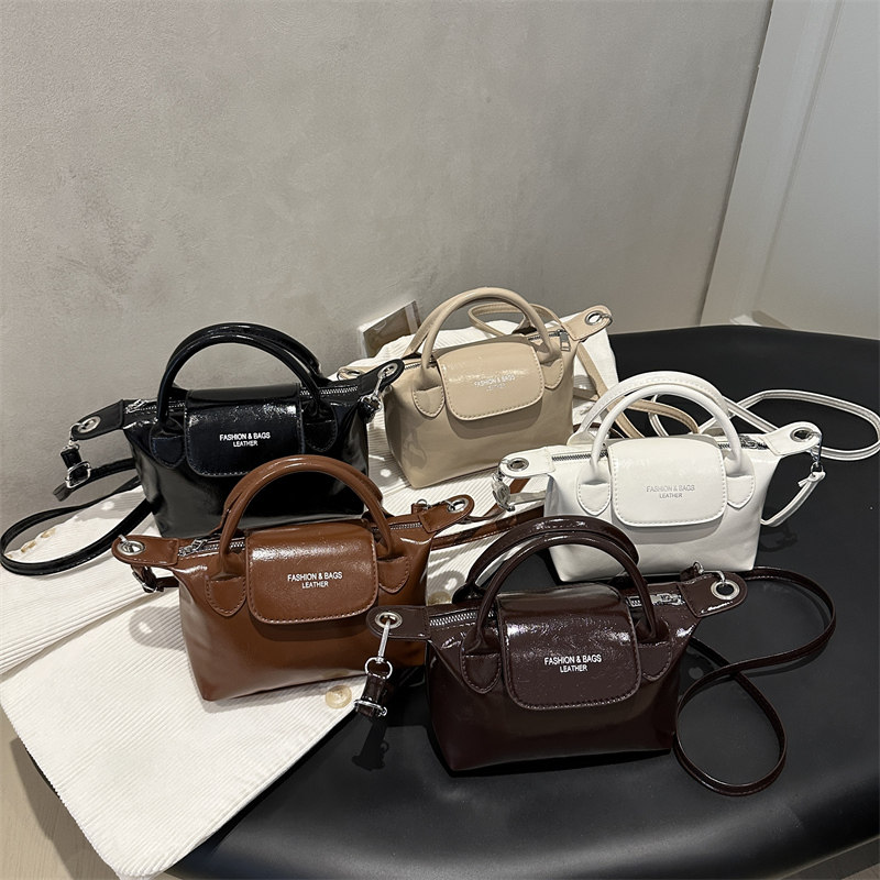 This year's popular bags, versatile cross-body bags, 2025 new women's bags, fashionable and simple hand-carried one-shoulder small bucket bags