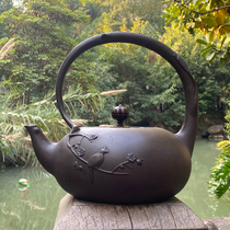 Iron jug Hebrewed with raised eyebrows cast iron Boiling Water Teapot Hand Retro Tea With Magpie Den Melian Body Yellow Muscle Sand Iron