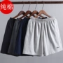 Quần short cotton cho nam nhà ngắn XL đồ ngủ mùa hè năm điểm quần đi biển thể thao quần thể thao quần short nữ lưng cao