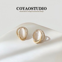 Cat eye stone ear clip without earhole woman small and delicate advanced senses Earrings temperament brief commuter mosquito repellent coil earrings