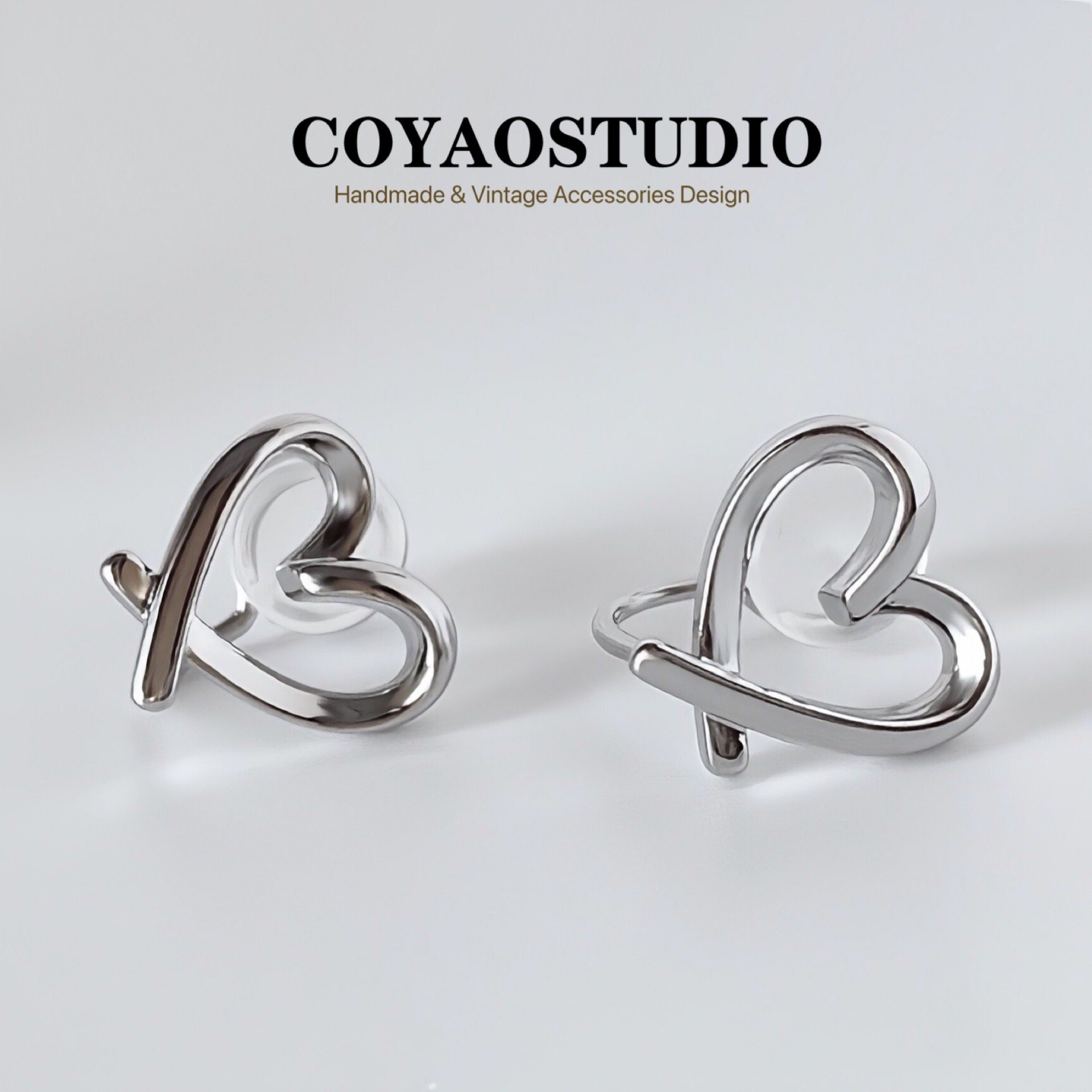 Hollow love ear clip mosquito incense plate without ear holes ins wind light luxury flash drill niche design simple temperament all-match