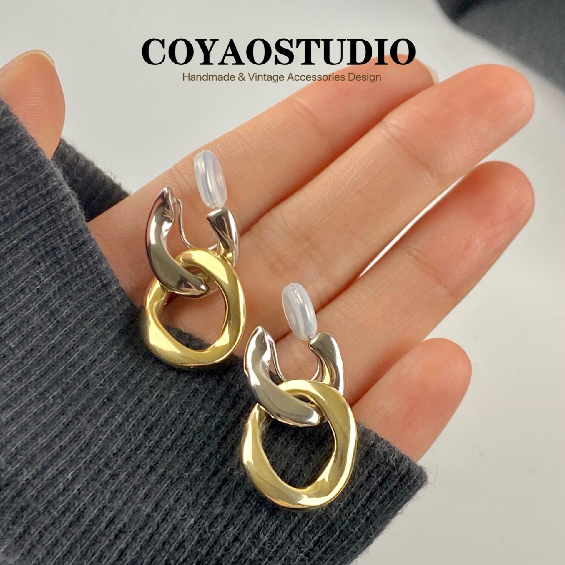 High-end metal feeling niche design ear clip female no ear hole mosquito coil temperament simple European and American cold wind earrings