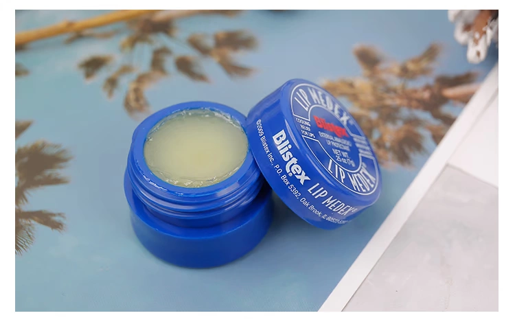 Zhou Beilei Manon American Blistex Bailei thích hợp lon nhỏ màu xanh nhỏ lọ dưỡng môi trắng dưỡng ẩm chống khô môi màng - Son môi 3ce private