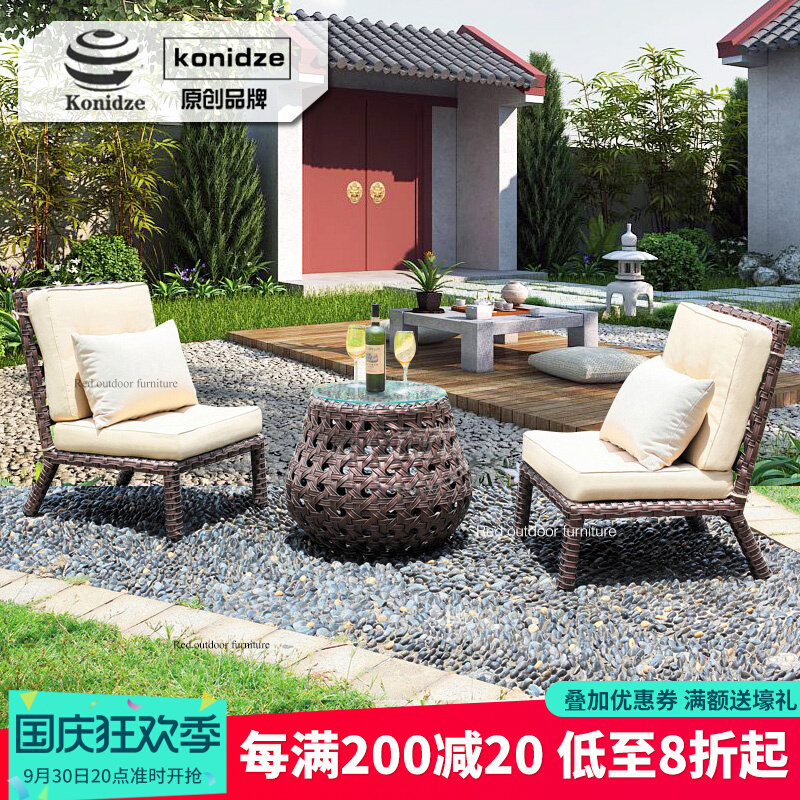 Outdoor furniture garden table and chair designer balcony rattan chair three-piece modern creative rattan model room leisure chair