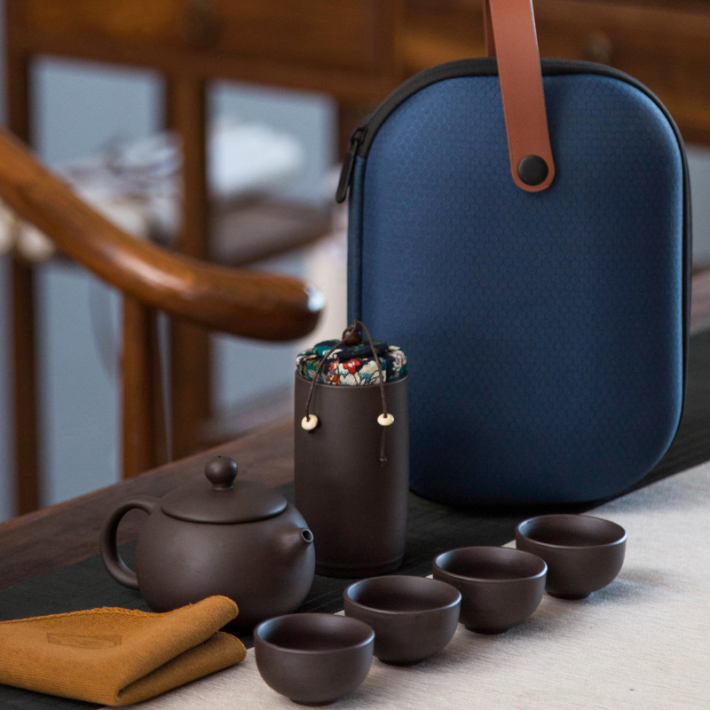 Violet arenaceous a pot of four cups of portable package travel tea set is suing crack cup travel xi shi pot of tea cups