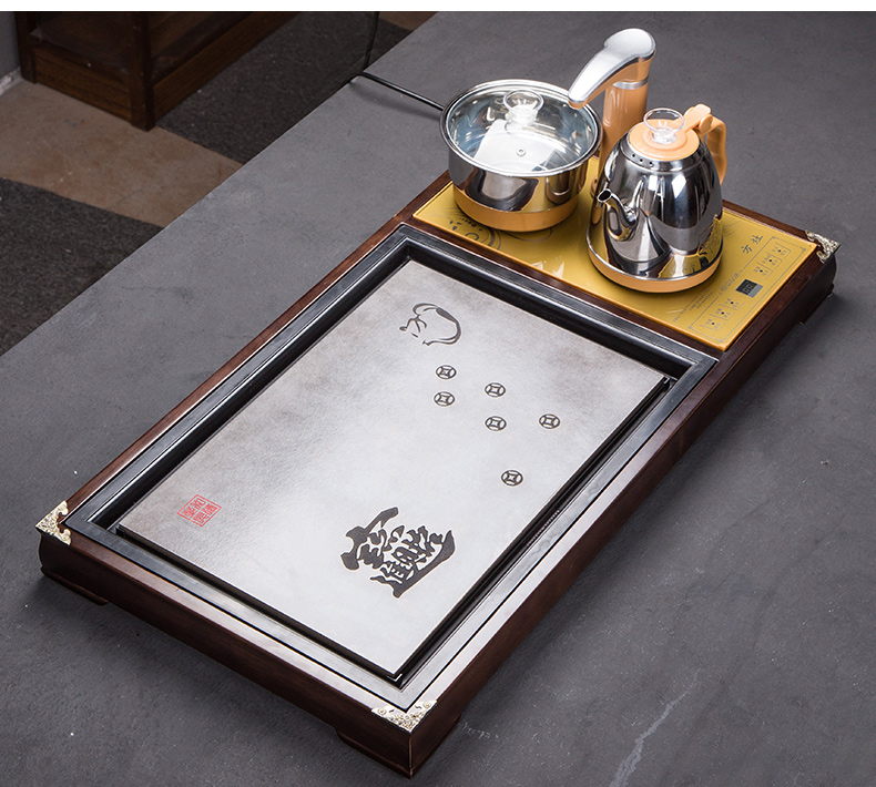 A complete set of glass tea set of household solid wood tea tray was violet arenaceous kettle fully automatic four unity is contracted and I kung fu