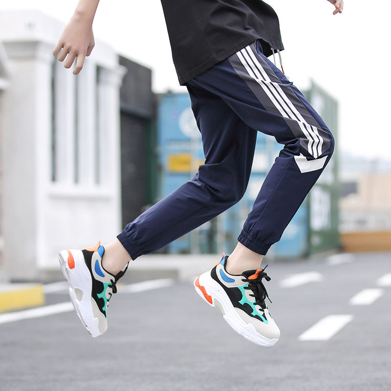 Boy's pants summer thin mode in large boy's elastic black speed dried pants loose leisure trousers for fat children's sports pants