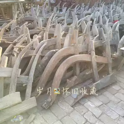 Old farm tools, old wood plows, old objects, plows, ancient cultivated land tools, wooden agricultural production tools