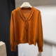 European station 2025 autumn and winter new European women's fashionable V-neck ruffled sweater age-reducing wool jacket trend