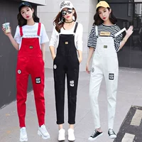 Quần yếm denim nữ 2018 xuân mới sinh viên thả lỏng jumpsuit lỗ rộng giản dị đồ nữ đẹp