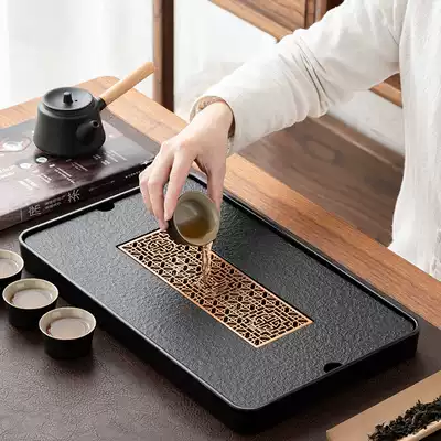 Tea tray household tray Wujin Stone tea table whole piece kung fu tea set dry bubble table with drainage Japanese tea tray Tea Sea
