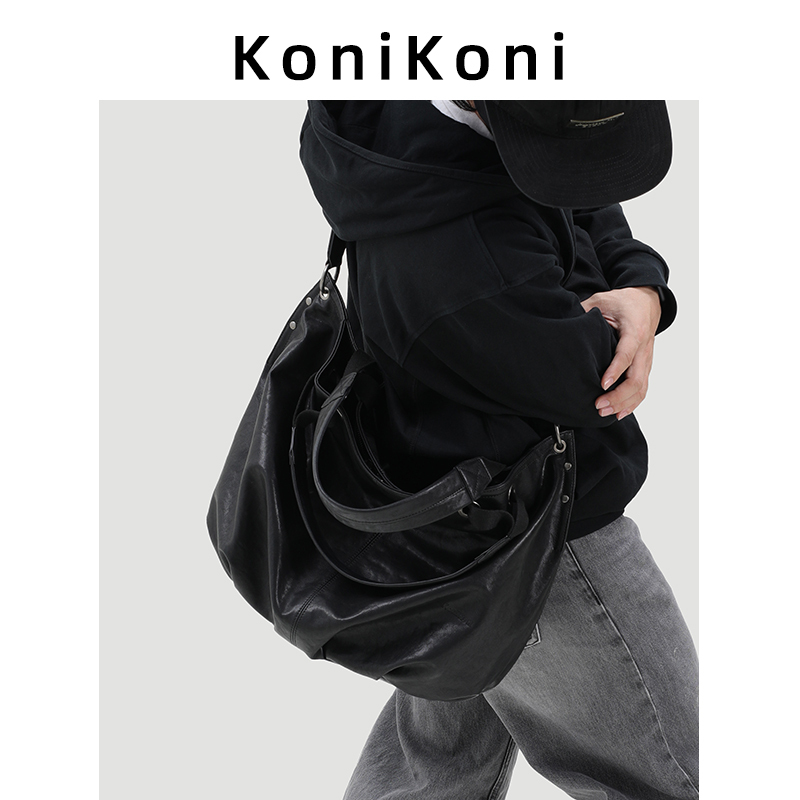 Konikoni Genuine Leather Black Men's Crossbody Bag 2026 New Model Large Capacity Tote Bag for Men Commuter Shoulder Bag