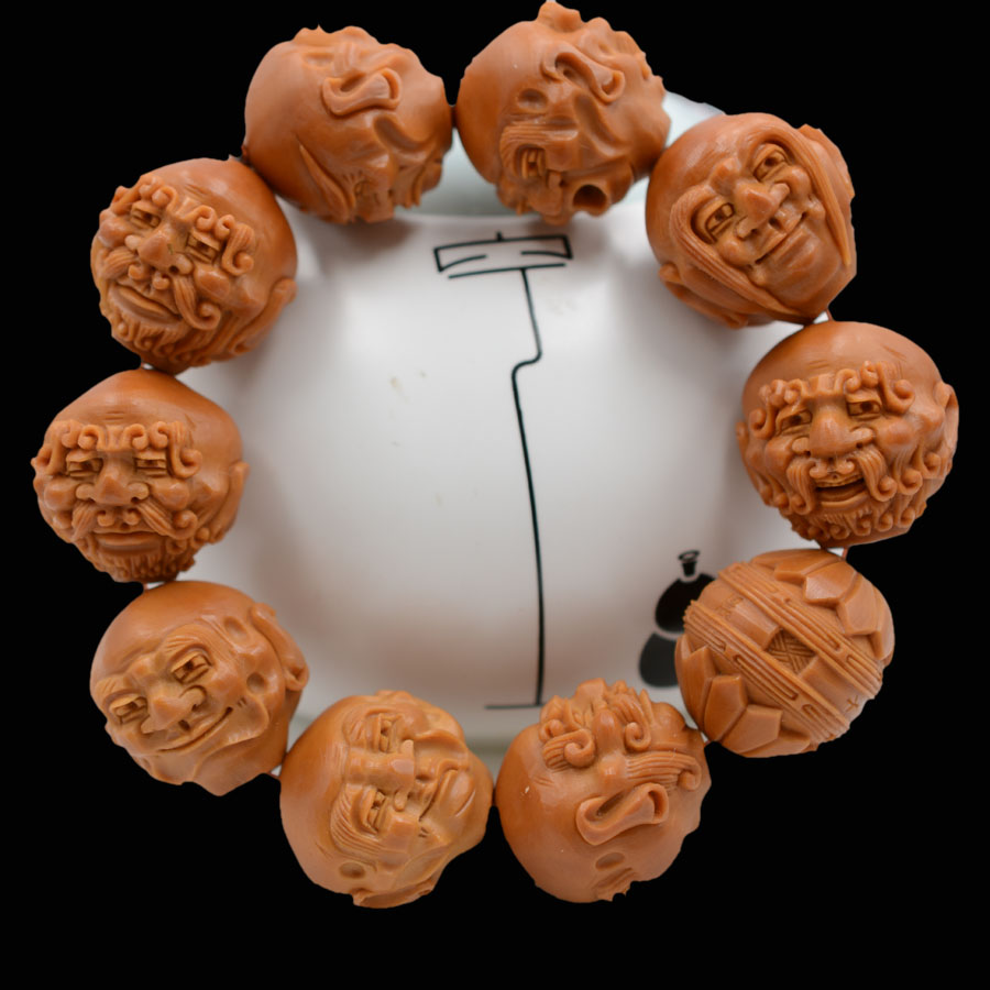 The Olive Nuclear Sculpture shall send a positive round of the Han hand strings of the famous Yu Chen nuclear sculptures to play boutique high-end gift men 's