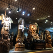Taihang cliff cypress root carving ornaments Ebony gold silk Nan Guanyin Maitreya Buddha statue Wood carving living room ornaments carving crafts