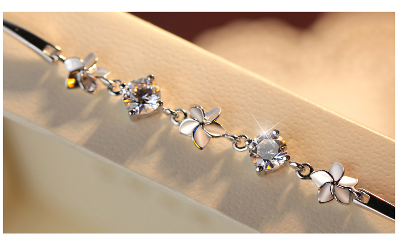Bạc vòng đeo tay nữ sterling bạc Hàn Quốc phiên bản của bốn lá cỏ ba lá rừng cô gái gió lạnh món quà thiết lập với swarovski zirconi vòng vàng 18k kiểu mới
