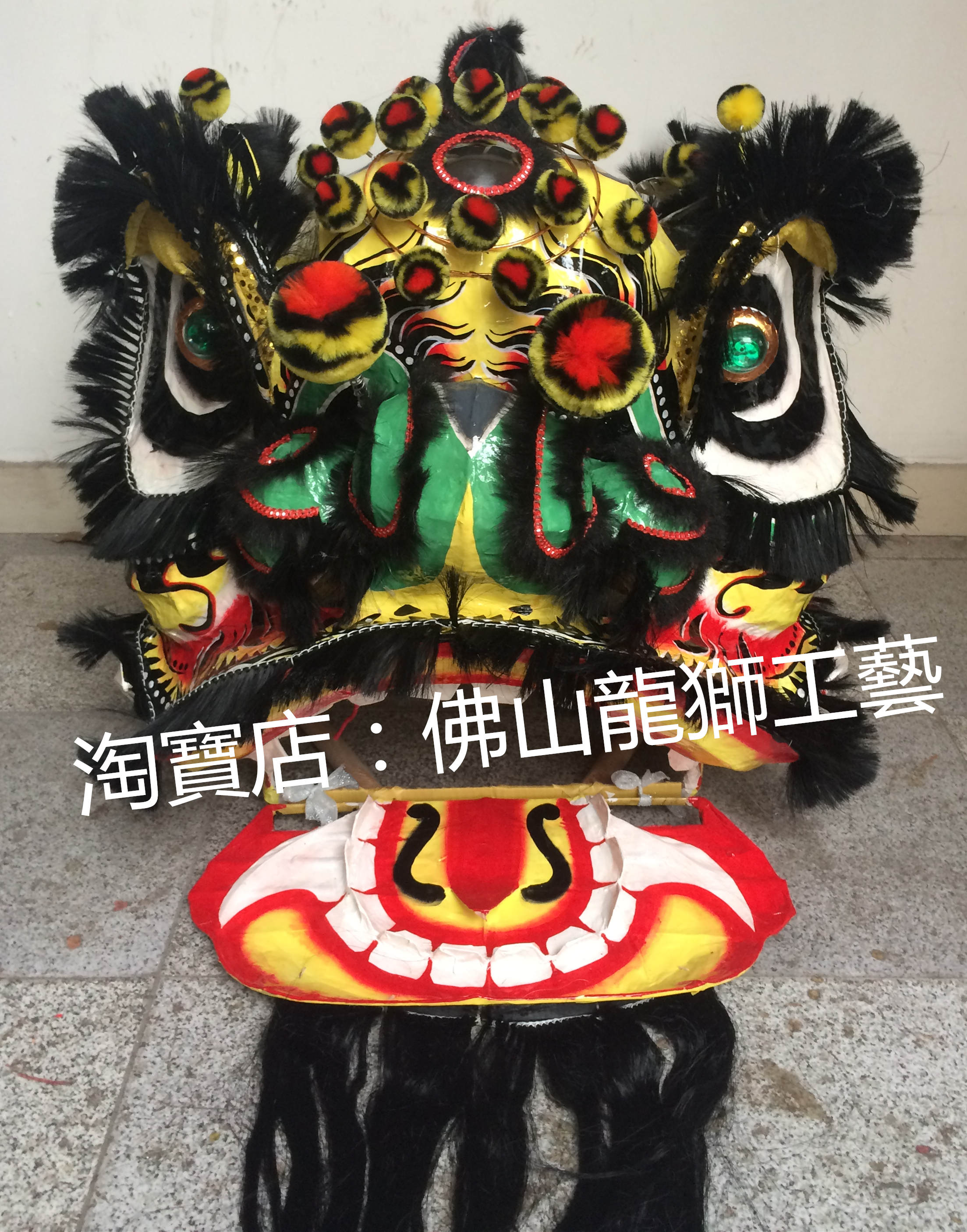 Authentic Foshan traditional double cheeks and bright teeth, a set of lion head with fire pattern on yellow background) handmade) autumn color) intangible cultural heritage