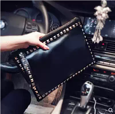 Korean version of the leather wrist bag trend rivet clutch bag fashion young men and women personality wild ipad clutch bag