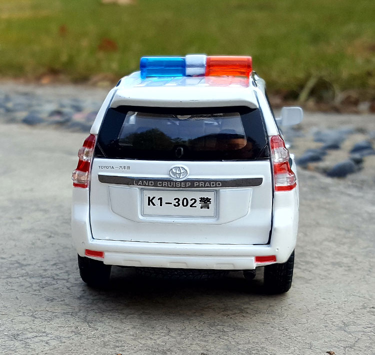 1:32 Prado SUV off-road cảnh sát xe hợp kim xe mô hình xe an ninh công cộng mô phỏng xe mô hình âm thanh và ánh sáng kéo trở lại đồ chơi - Chế độ tĩnh mô hình xe ô tô
