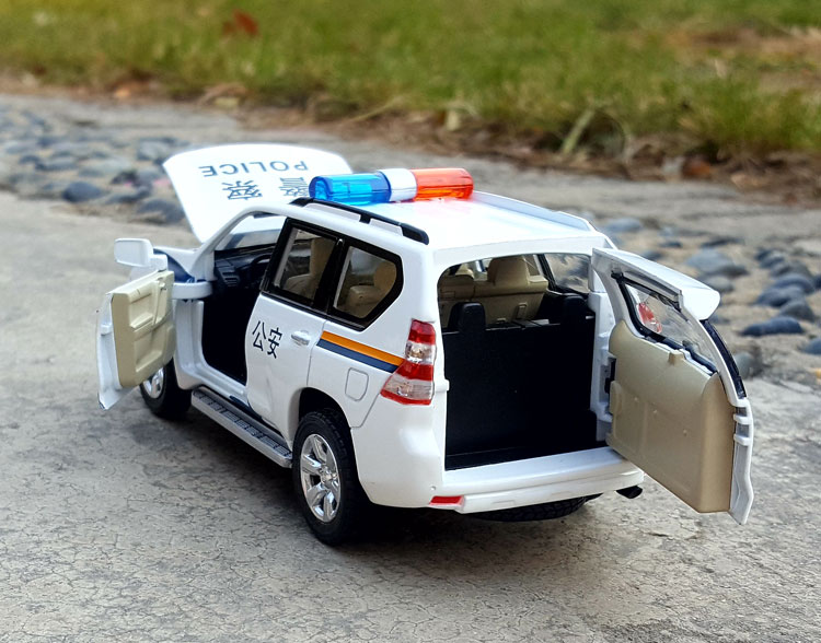 1:32 Prado SUV off-road cảnh sát xe hợp kim xe mô hình xe an ninh công cộng mô phỏng xe mô hình âm thanh và ánh sáng kéo trở lại đồ chơi - Chế độ tĩnh mô hình xe ô tô