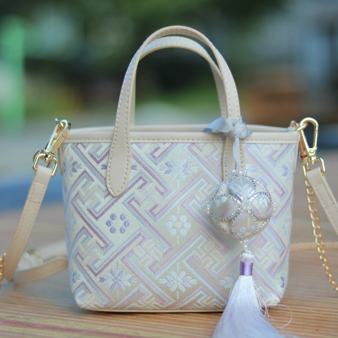 Гуанси Нематериальное культурное наследие Чжуанский узор из парчи Маленькая сумка-тоут Этническая мода Офисный работник Ручной посыльный Маленькая сумка