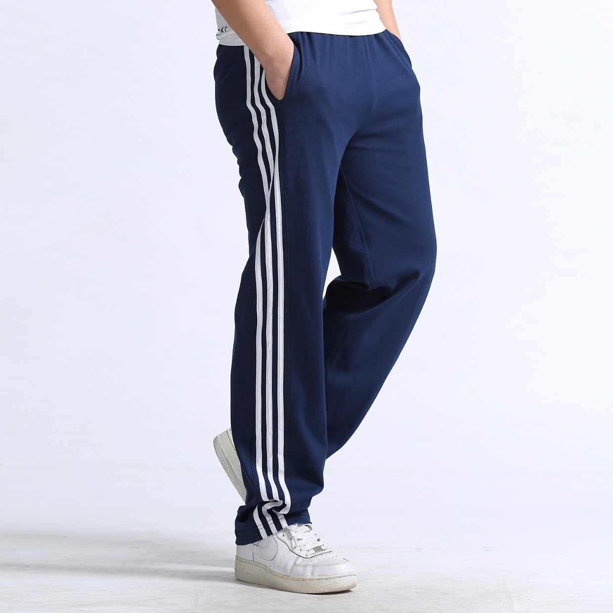 Quần thể thao nam mùa thu đông mới cộng với nhung dày, quần rộng, lỏng lẻo Quần XL chạy quần Wei chất béo quần tây