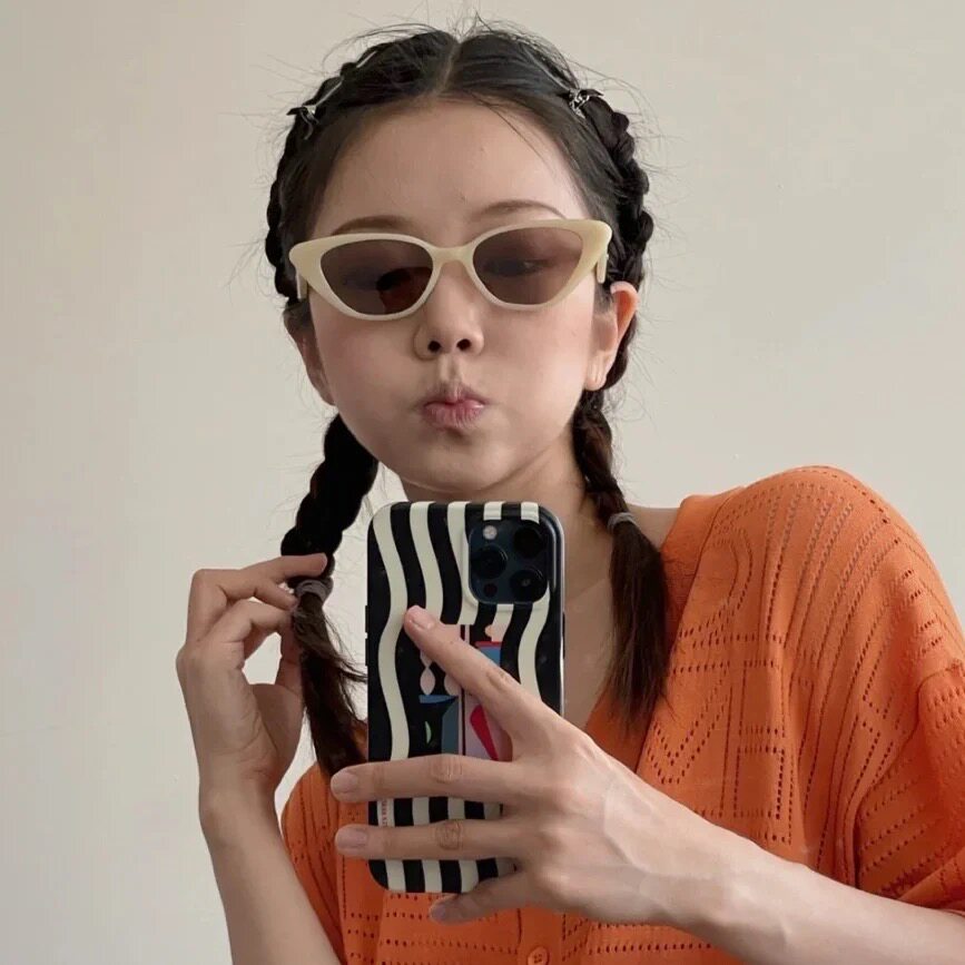 Cai Xukun's same cat glasses female Han edition of UV - proof round face superior sense in wind sunglasses male