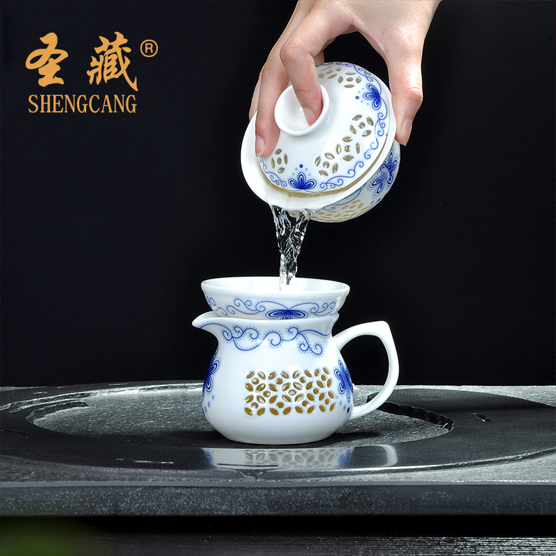 A complete set of exquisite time tea service suit hollow ceramic kung fu tea cup lid to use simple Chinese style is contracted with tea