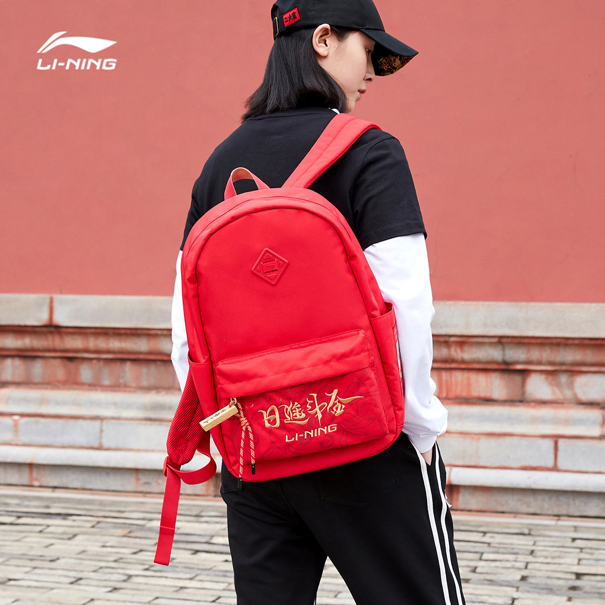 Li Ning backpack flagship spring new year limited day into the bucket gold red backpack computer bag male and female student school bags