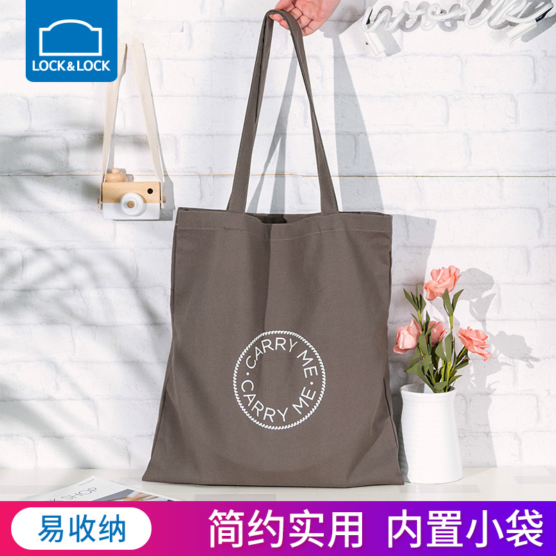 Le clasp Le clasp Korean version of simple design sense male and female students canvas bag female ins one shoulder stick figure large shopping bag