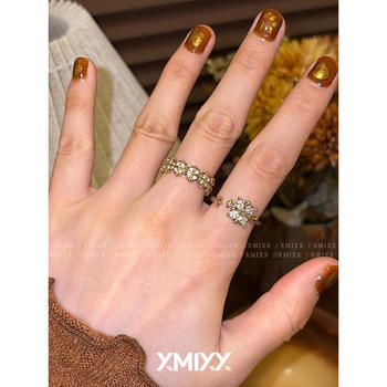 Light luxury niche four-leaf iris stacked open ring for women