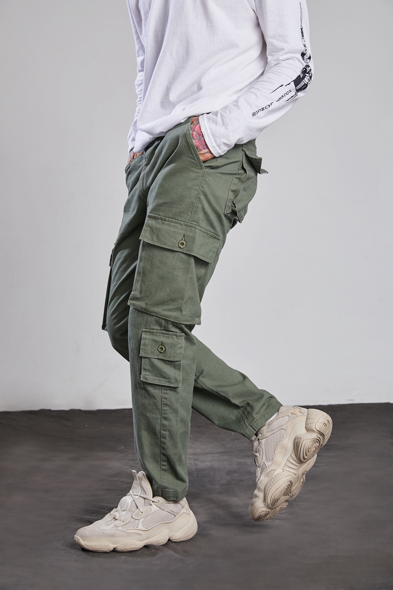 Quần lửng lưới màu đỏ nam triều thương hiệu Hàn Quốc phiên bản hip hop quần nhỏ chân xu hướng đường phố chín điểm quần âu nam