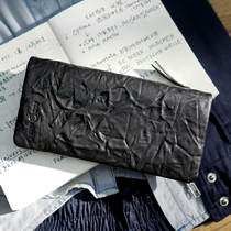 Cow - skin black hand grabbed simple fold long wallet Ms. Lady leather mobile phone bag