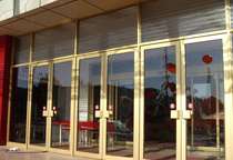 Nanjing ground bounce door glass door KFC door stainless steel edge tempered floor spring door company door sliding door