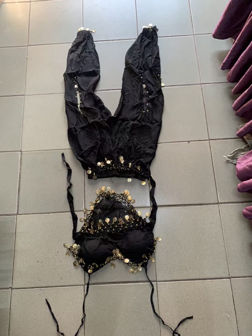Play in the suit of a belly dance outfit.